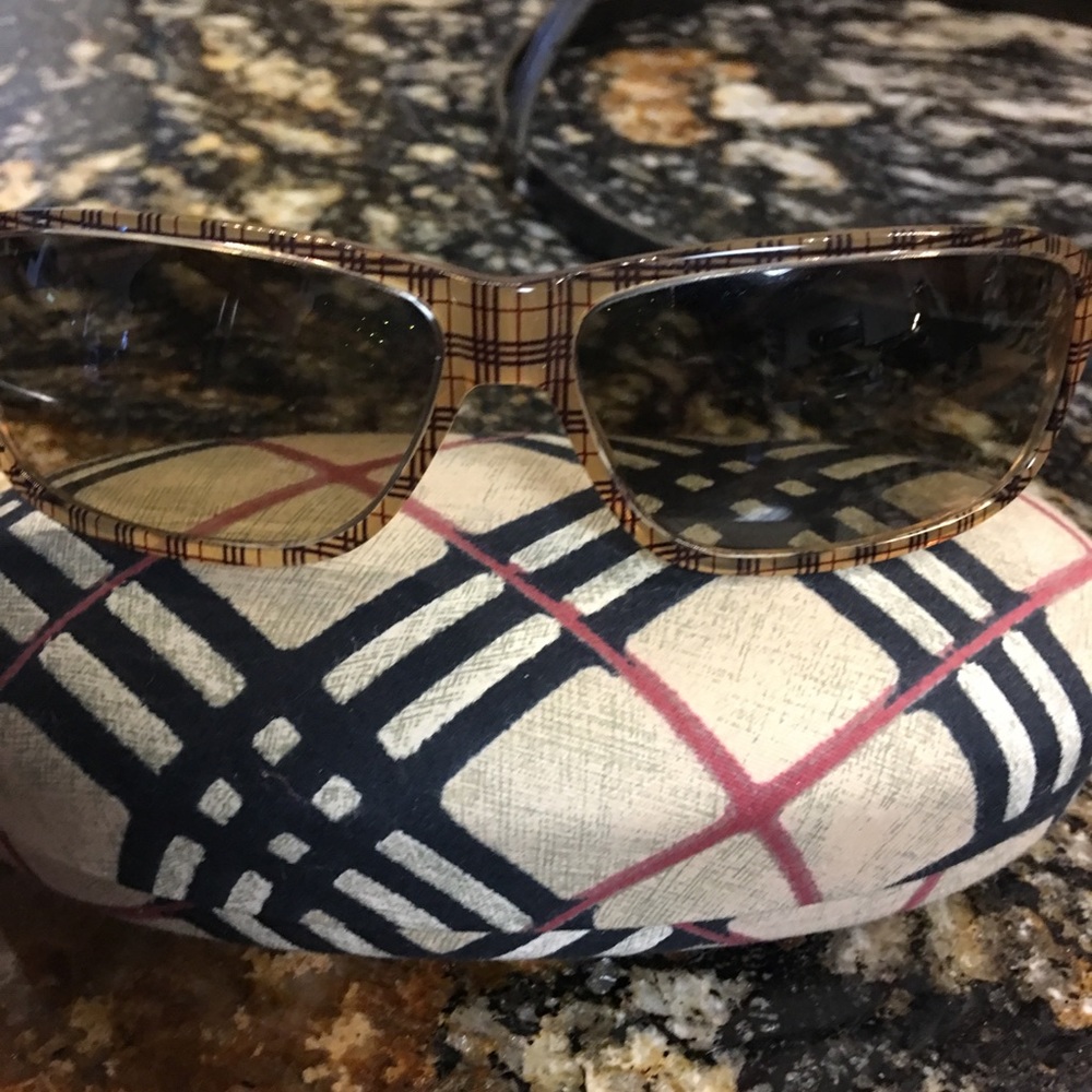 Burberry Sunglasses and Burberry Sunglass Case.